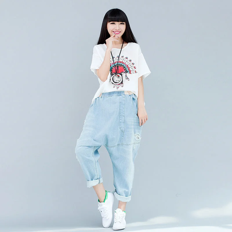Ripped Baggy Jeans - Wide Leg Distressed Denim, Streetwear Style Trendy Cut-Off Denim Shorts Ripped Baggy Jeans - Wide Leg Distressed Denim, Streetwear Style Trendy Cut-Off Denim Shorts